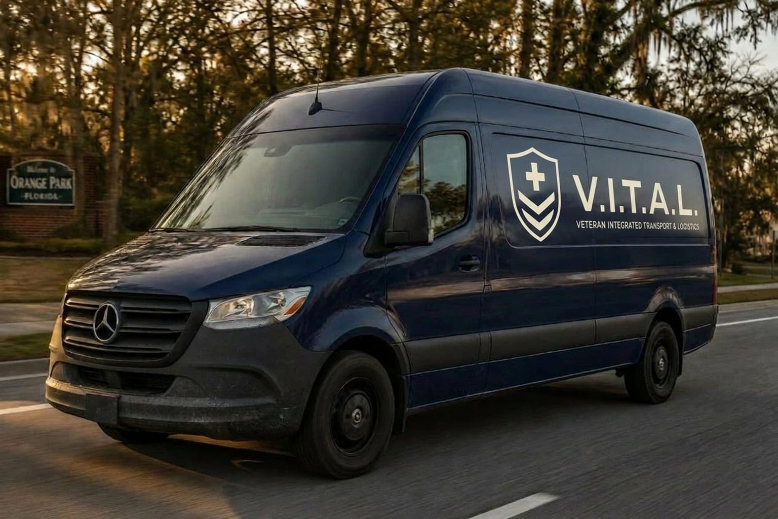 Medical transport vehicle in motion at dusk